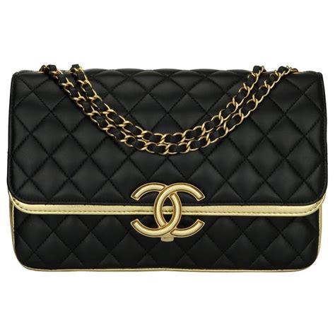 chanel black and gold handbag|Chanel bag with gold hardware.